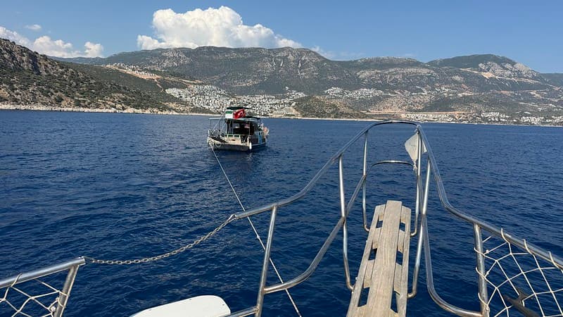 Our boat being towed back into harbour
